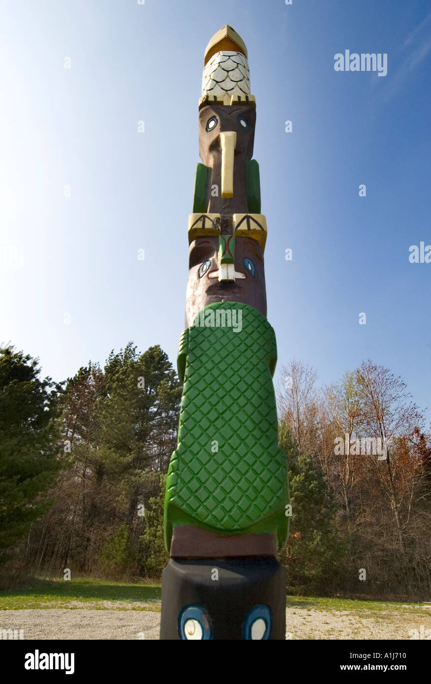 American Chippewa Indian tribe totem pole located in Port Huron Michigan tribal grounds Stock Photo