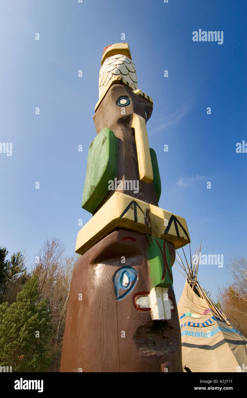American Chippewa Indian tribe totem pole located in Port Huron Michigan tribal grounds Stock Photo