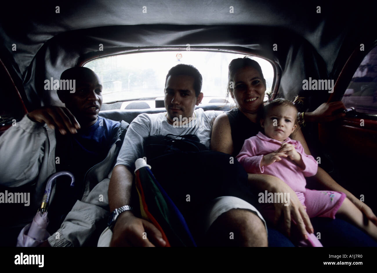 Cuba Passengers On The Backseat Of An Old American Vintage Car Stock Photo Alamy