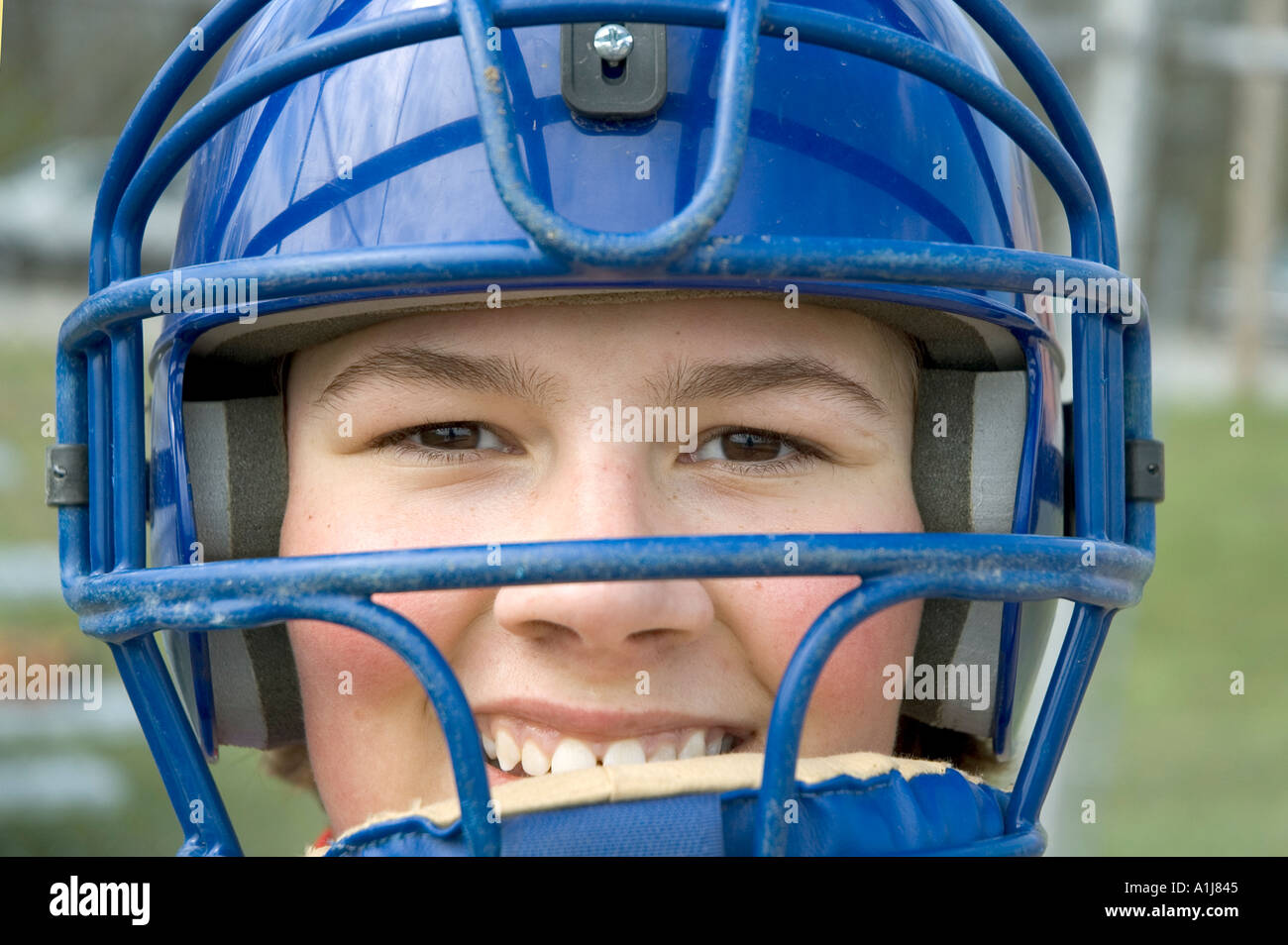 Portrait of a 13 year old female softball catcher Stock Photo