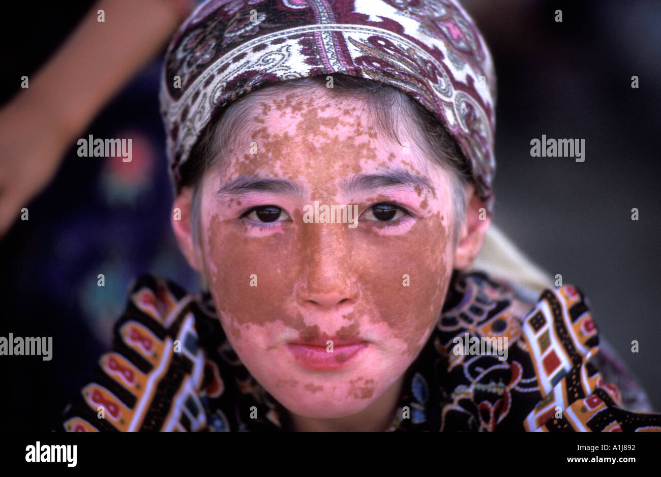 Young Uzbek child in traditional costume, Samarkand, Uzbekistan ...
