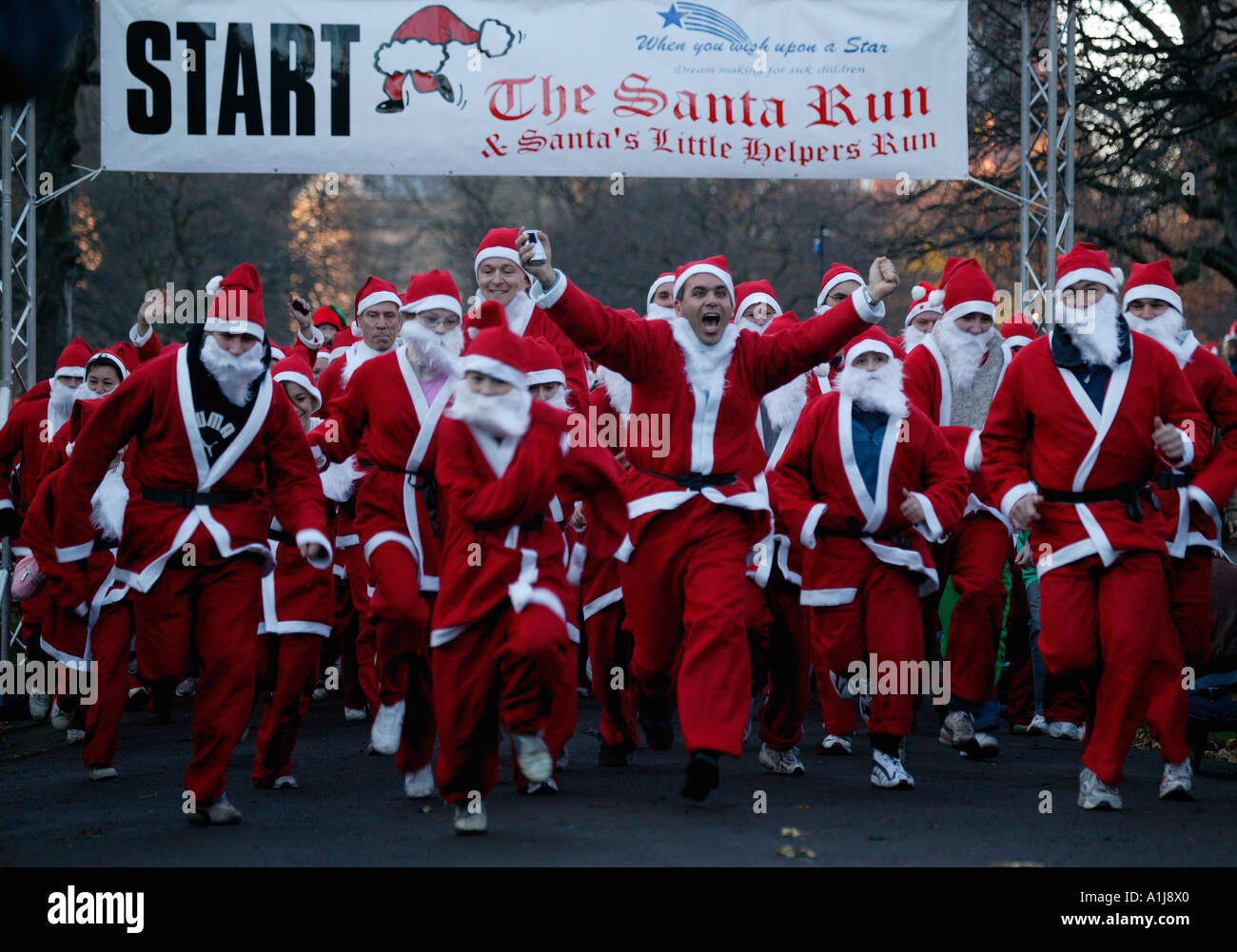 People dressed up as Santa Claus, preparing to start Santa Run, Edinburgh, Scotland, UK,  Europe, Stock Photo