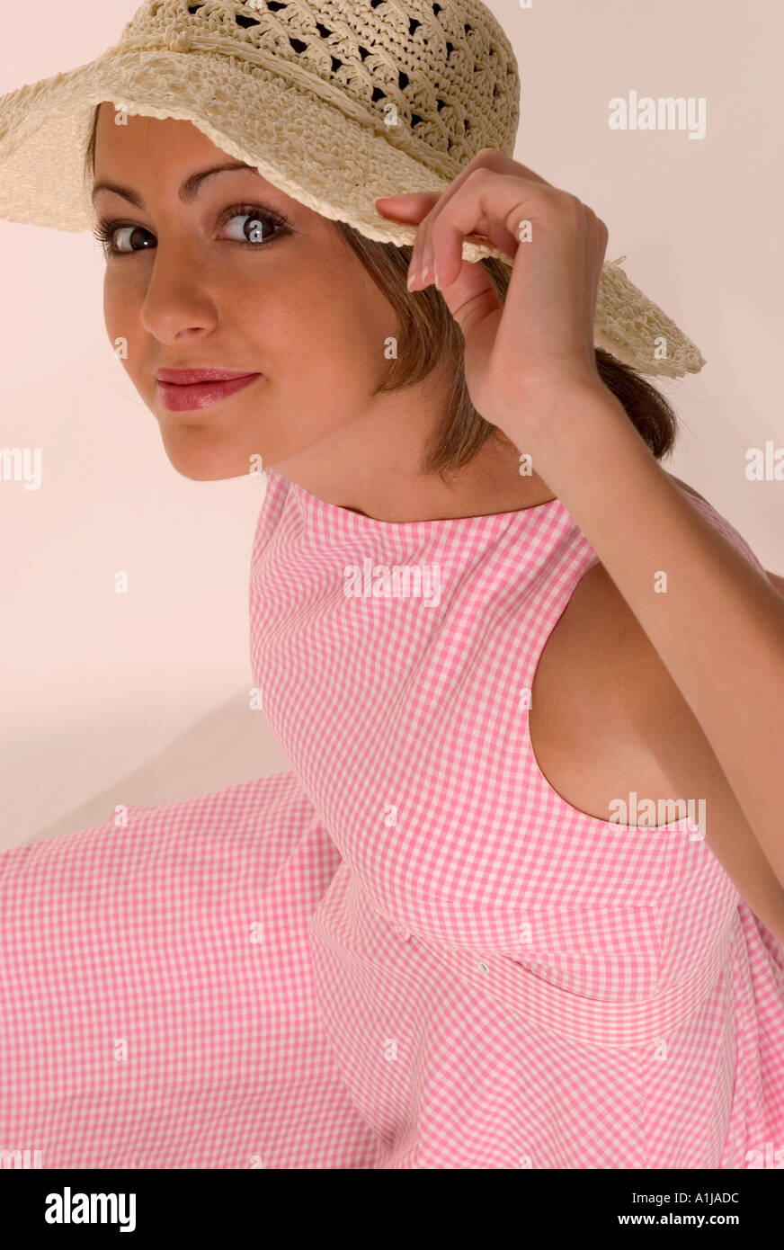 Closeup caucasian teen girl wearing pink hat hires stock photography