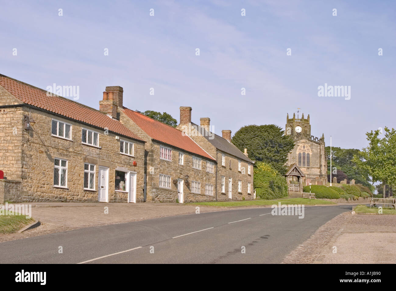 Coxwold North Yorkshire UK Cottages and church Stock Photo
