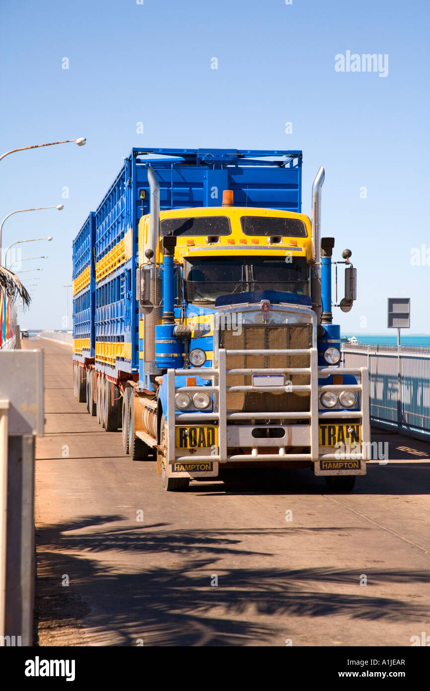 Cattle truck driving off jetty after delivering live cattle for export to cattle ship at Port of Broome Western Australia Stock Photo