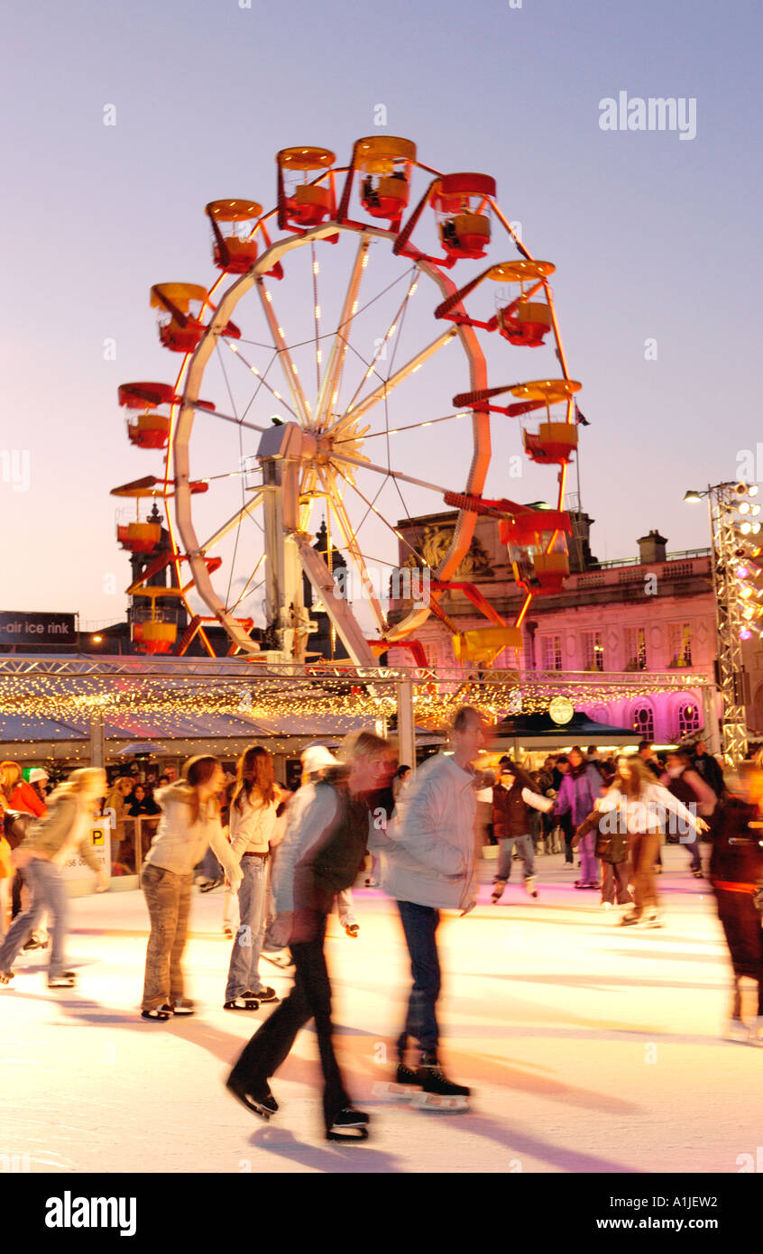 Winter Wonderland event outside Cardiff City Hall Wales UK with people skating on the ice rink