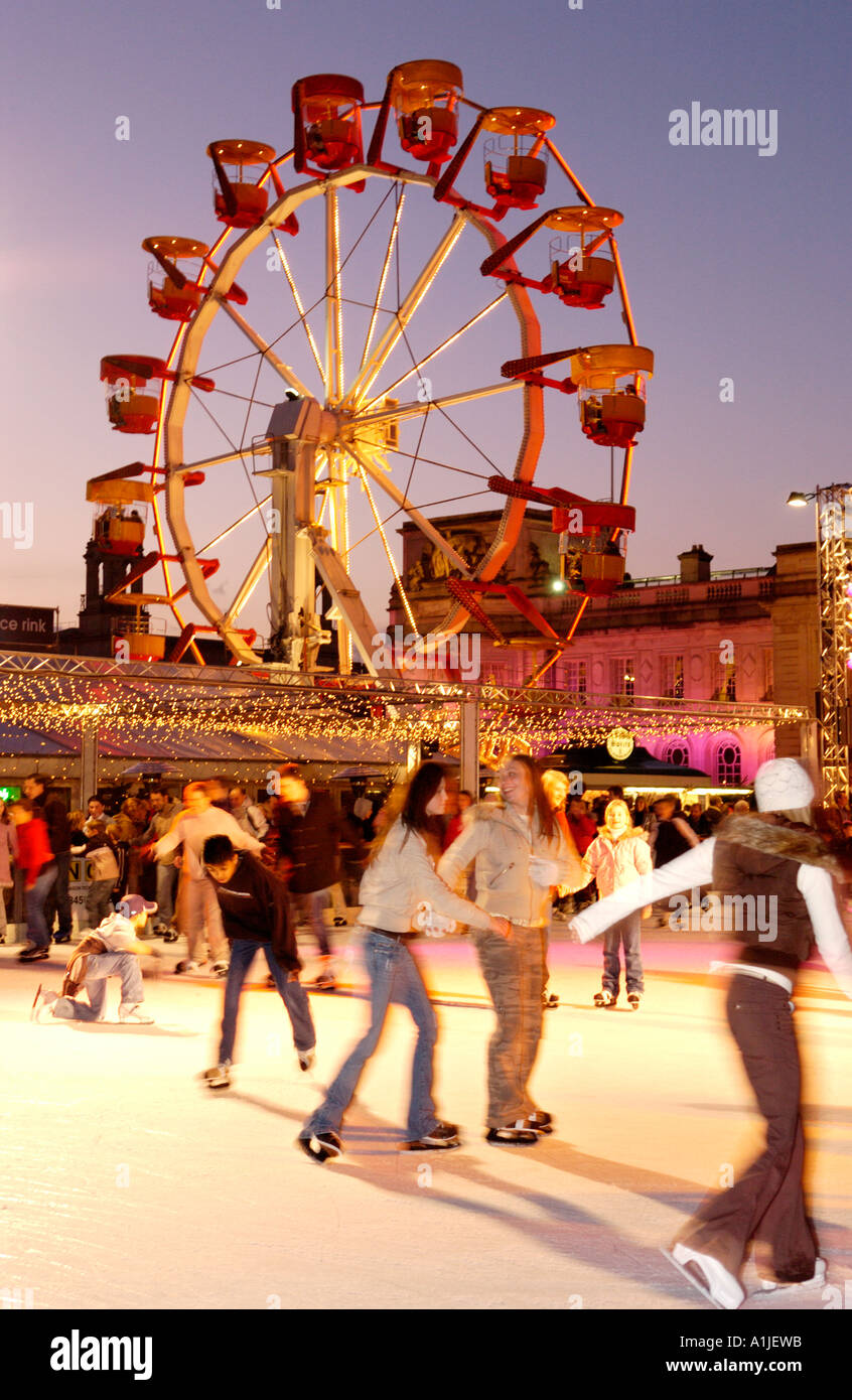 Winter Wonderland event outside Cardiff City Hall Wales UK with people skating on the ice rink