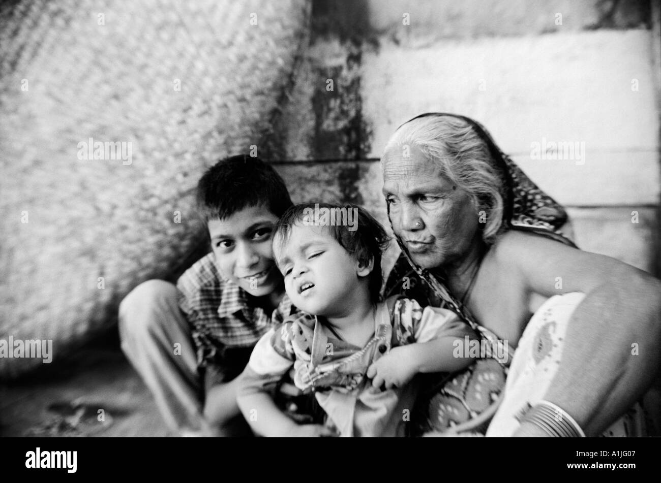 Grandmother With Grandchildren In Varanasi Uttar Pradesh India Stock