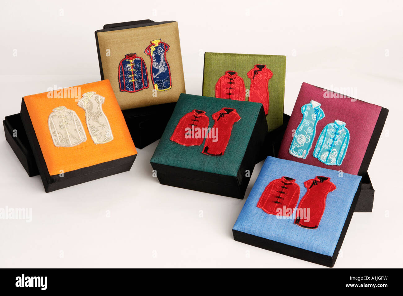 High angle view of traditional Chinese outfits embroidered on boxes Stock Photo