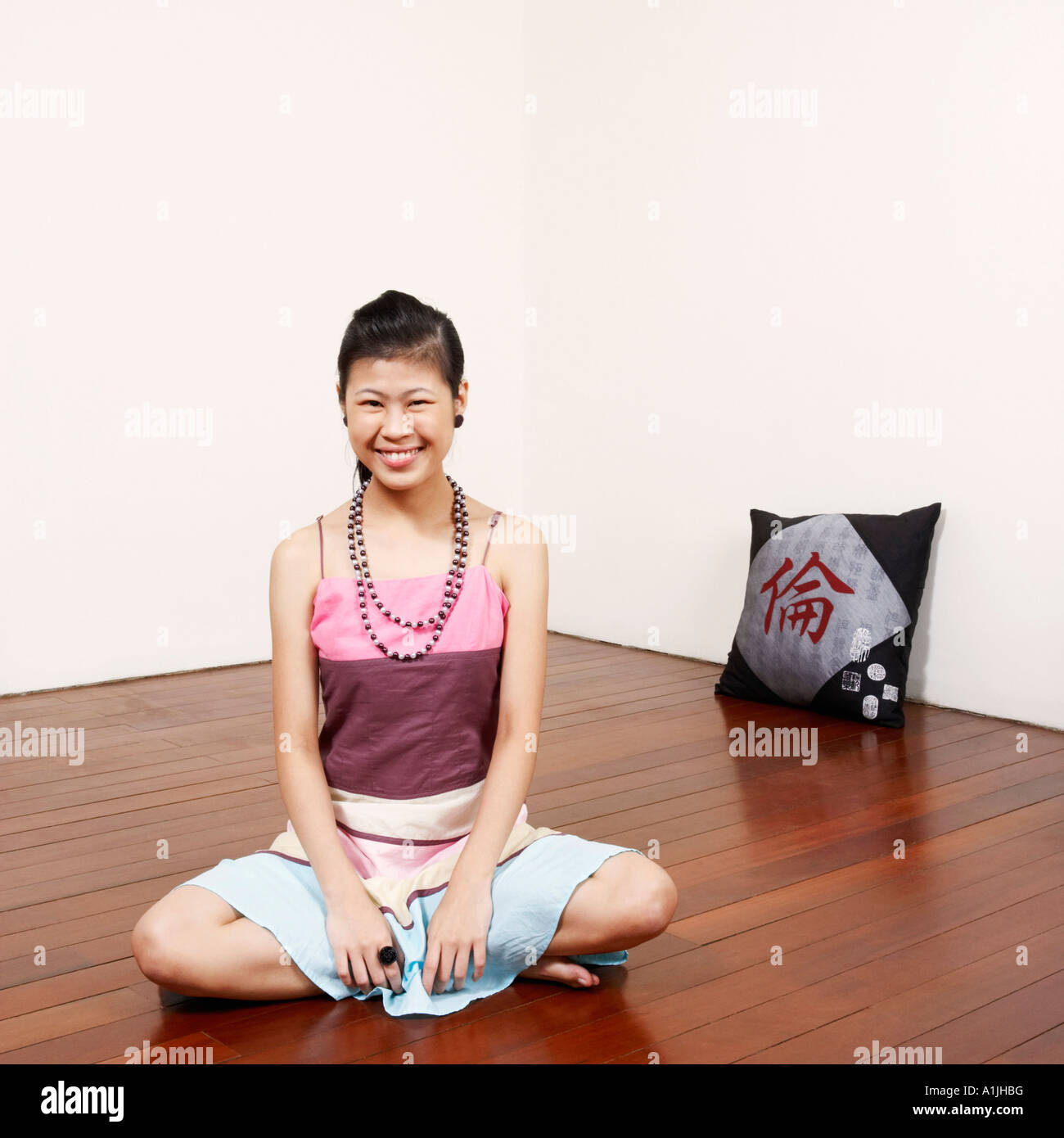 Chinese woman sitting floor barefoot hi-res stock photography and ...