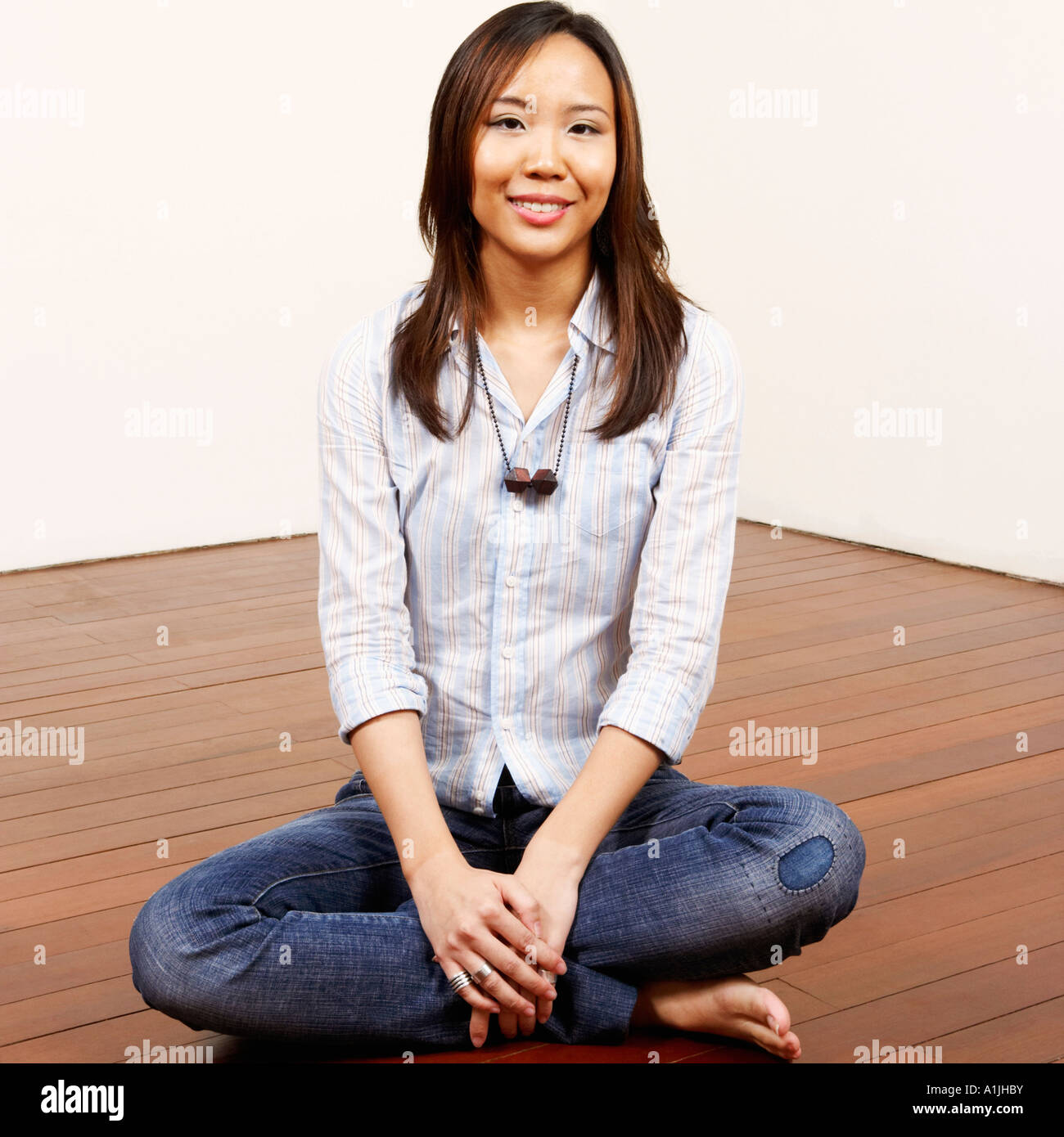 Chinese woman sitting floor barefoot hi-res stock photography and ...