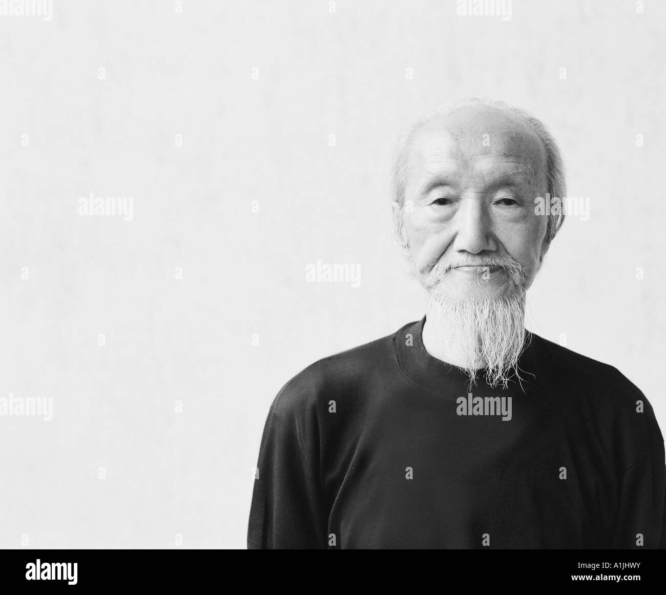 Old chinese man with white beard Black and White Stock Photos & Images ...