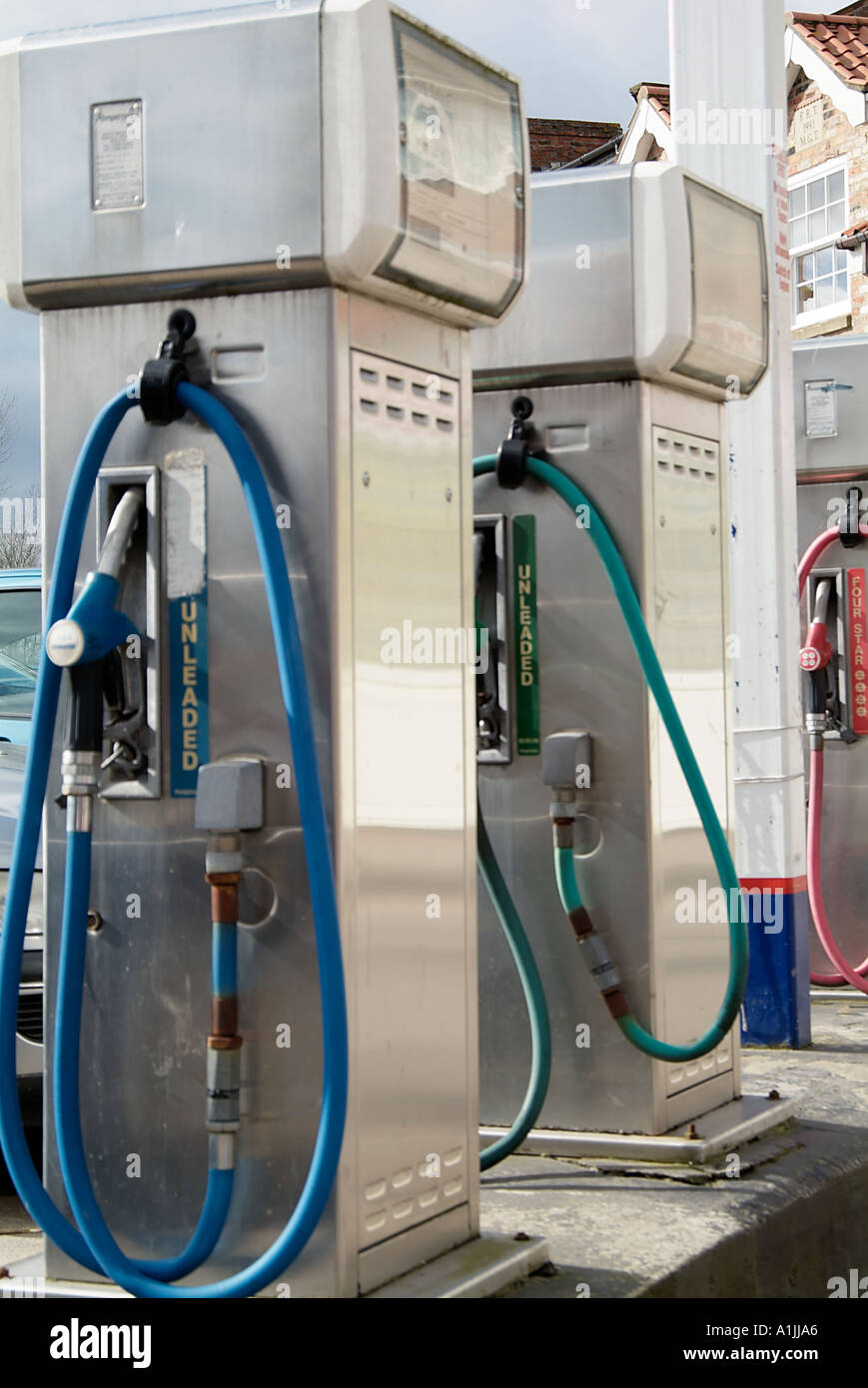 petrol pump gas station car oil diesel nozzle fill up burn fossil fuel