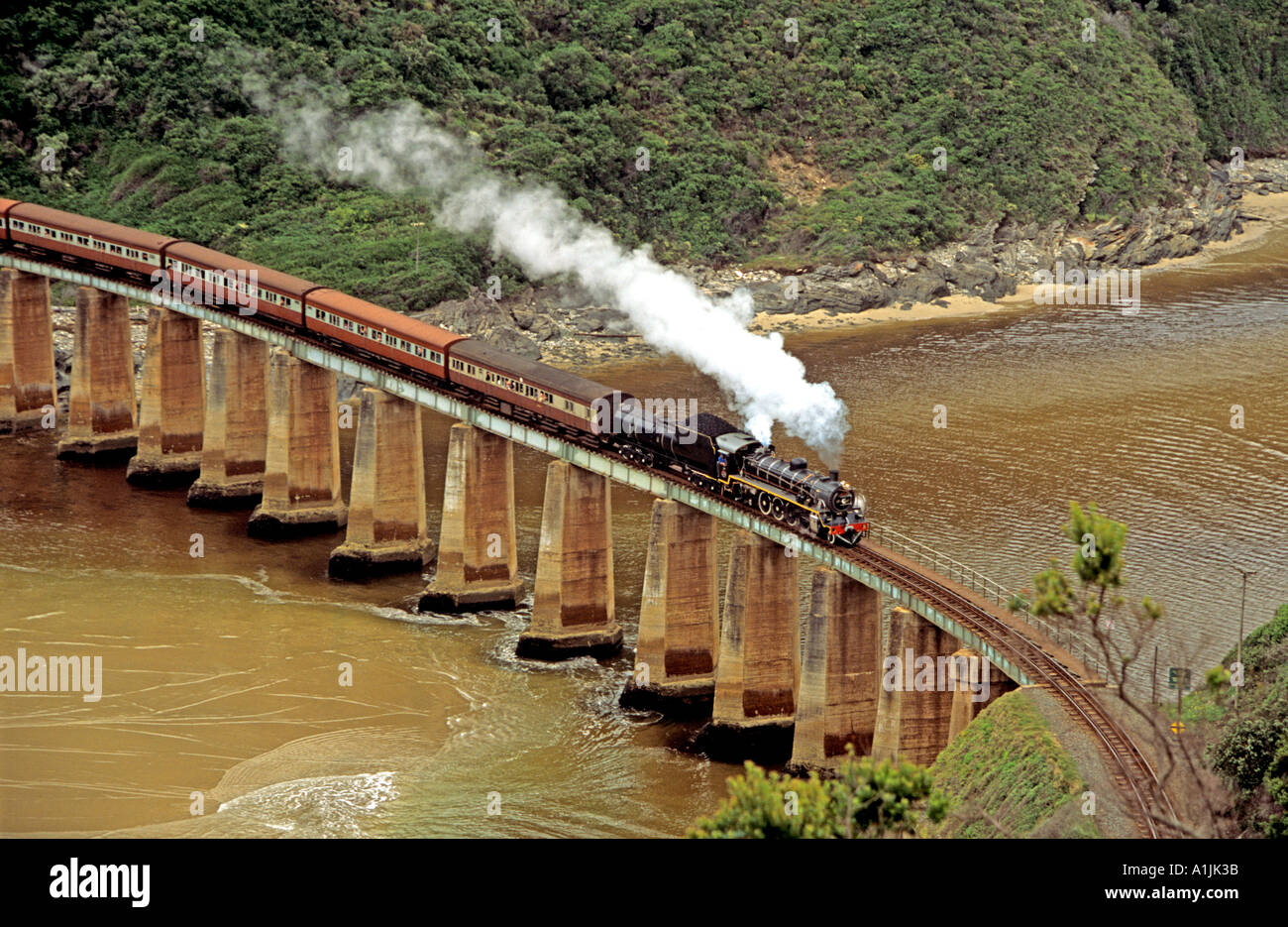 WILDERNESS SOUTH AFRICA October Tootsie a steam train at Dolphin Point crossing Kaaimans River Bridge Stock Photo