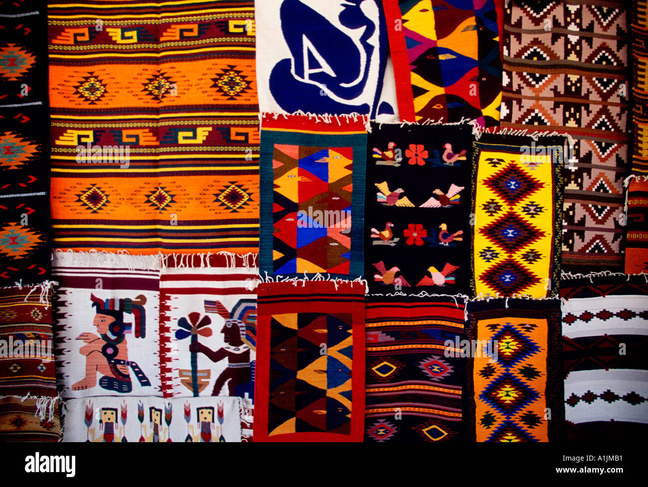 vendor seller selling textiles rug rugs carpet carpets at Saturday