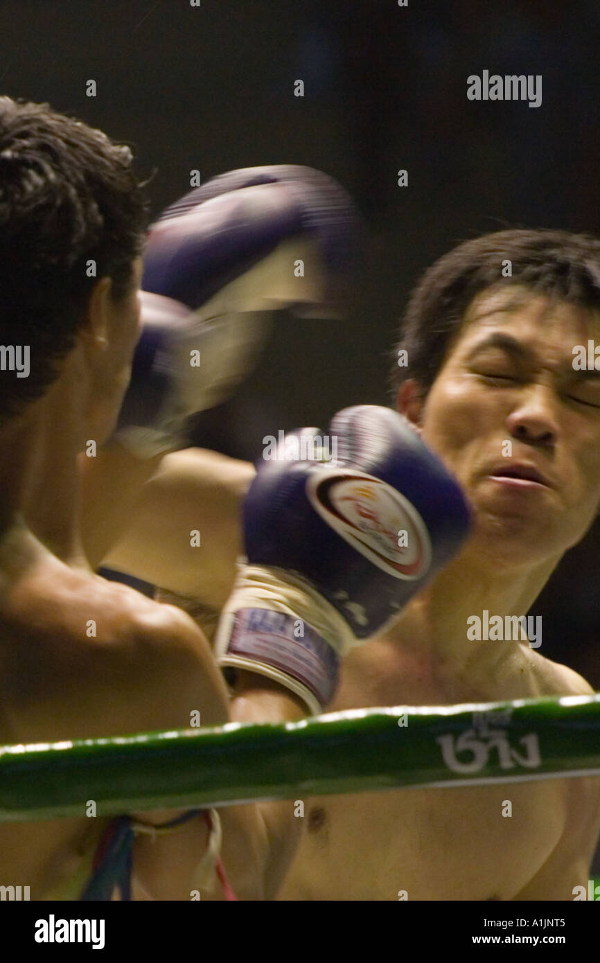 Muay Thai - Punch in motion Stock Photo