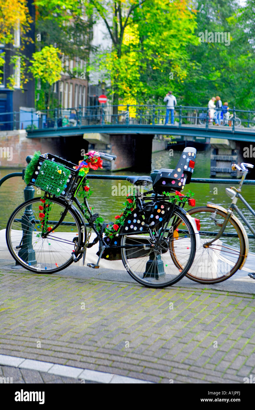Decorated individualised bike on bridge in Amsterdam Stock Photo Alamy