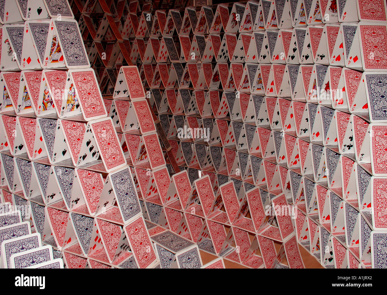 Pyramid of playing cards Stock Photo - Alamy