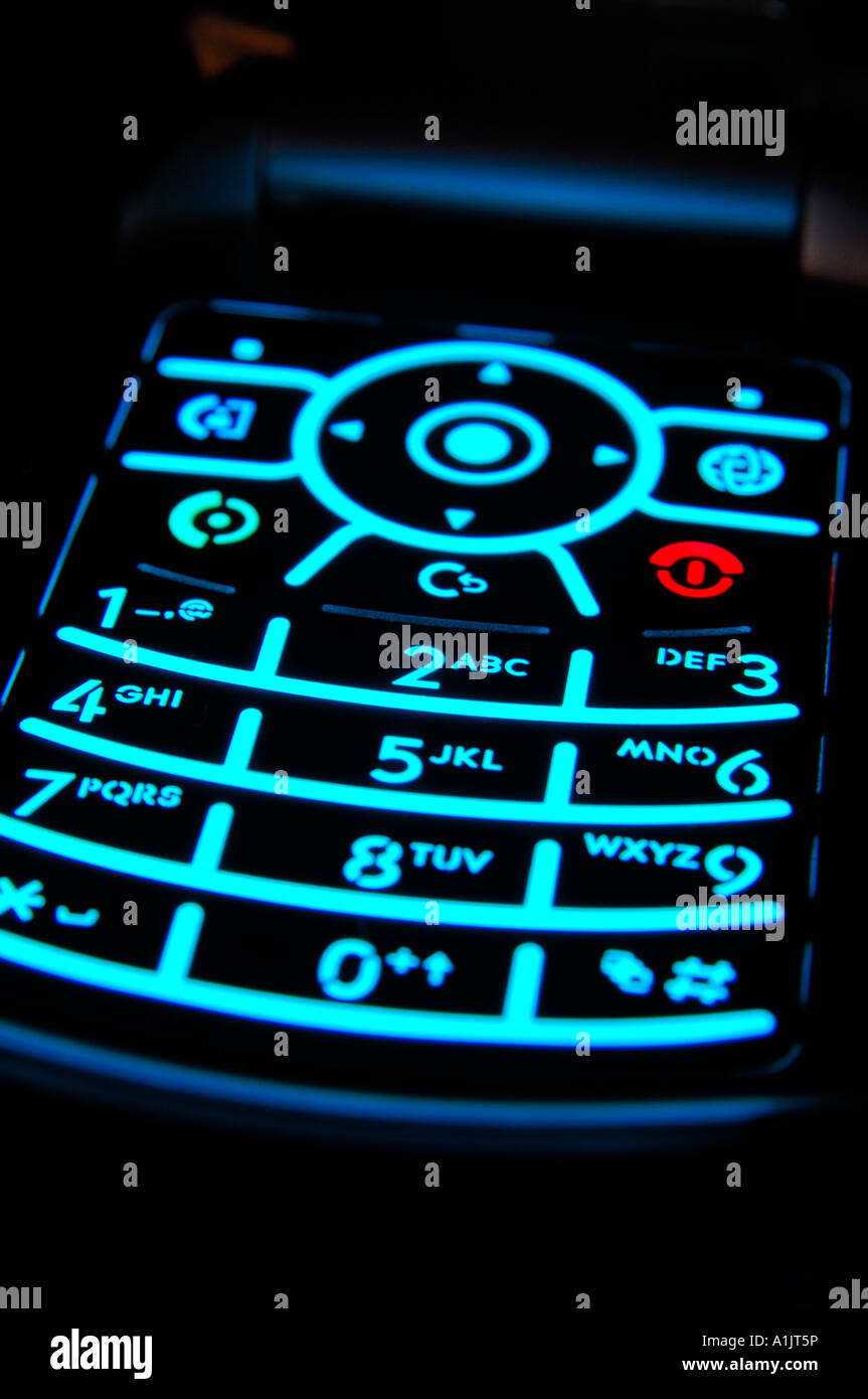 Illuminated keypad of modern mobile phone againt a black background Stock  Photo - Alamy