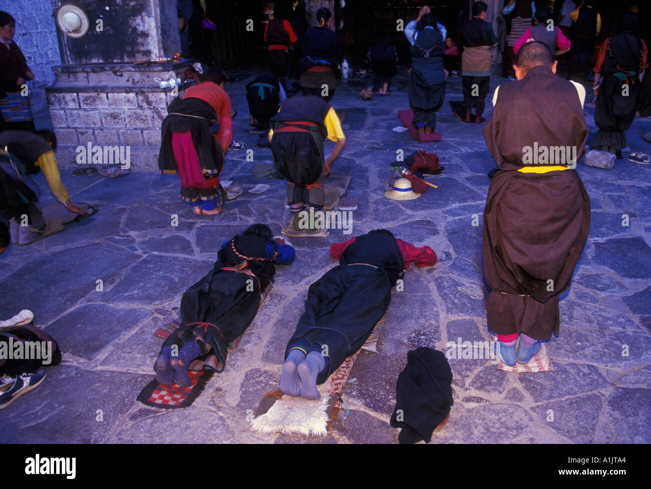 Tibetan people, Buddhists, pilgrim, pilgrims, circumambulate, circumambulation, Jokhang Temple, Barkhor Square, Lhasa, Tibet, China, Asia Stock Photo