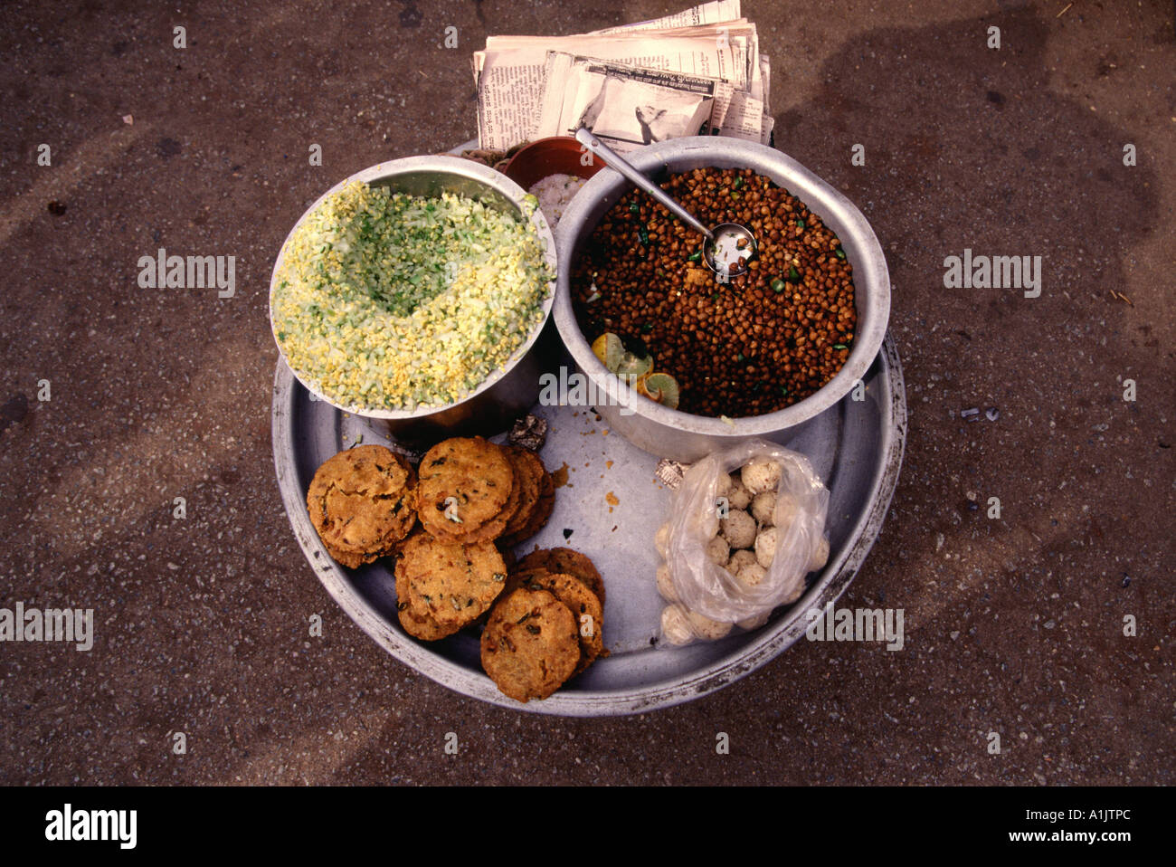 Indian street food of chickpeas and deep fried snacks in the state of Tamil Nadu South India Stock Photo