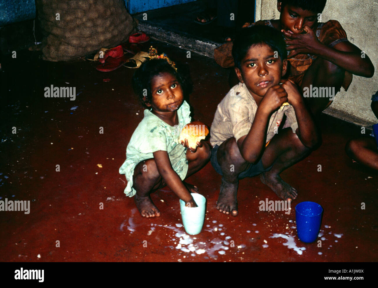 Children from the Slums being fed Kolkata India Stock Photo
