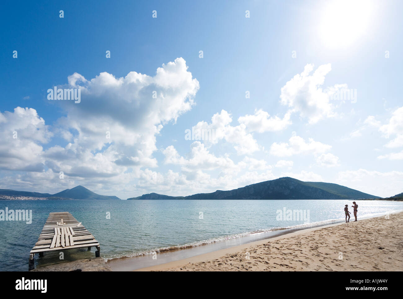 Couple on Golden Beach, Yialova, Messinia, Peloponnese, Greece Stock Photo