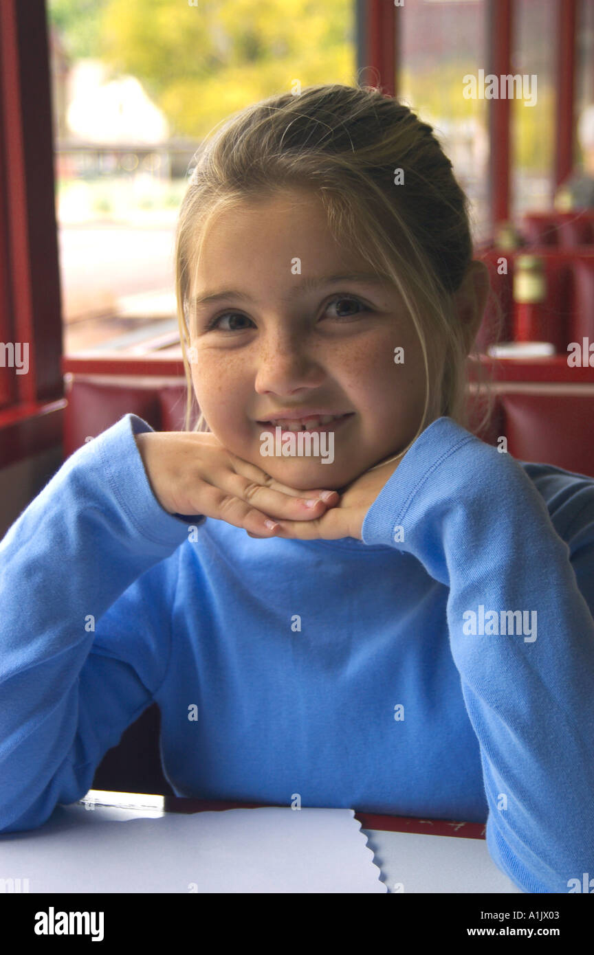 Girl hands under chin portrait hi-res stock photography and images - Alamy