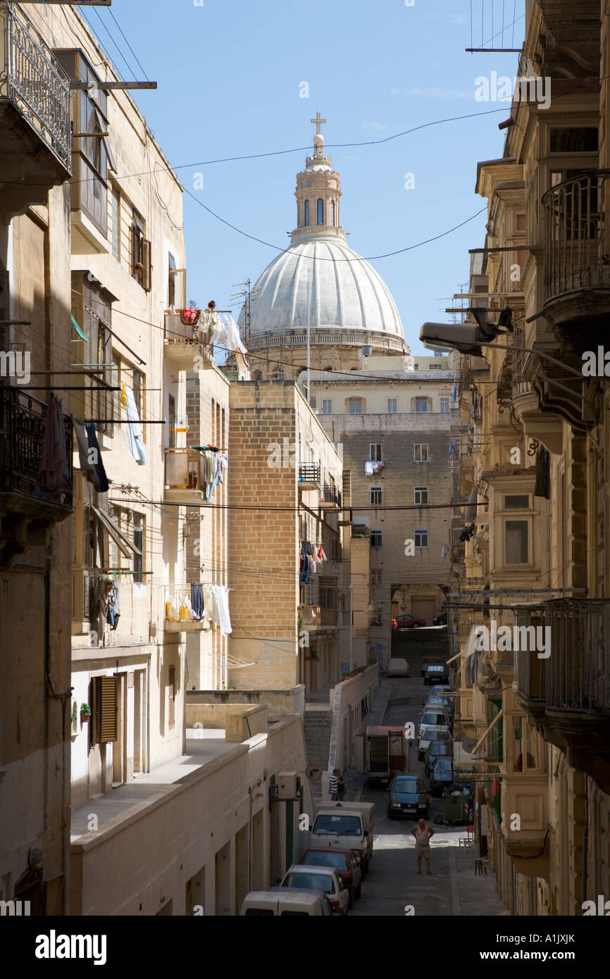 Sidestreet and the Dome of the Carmelite Church, Valletta, Malta Stock Photo