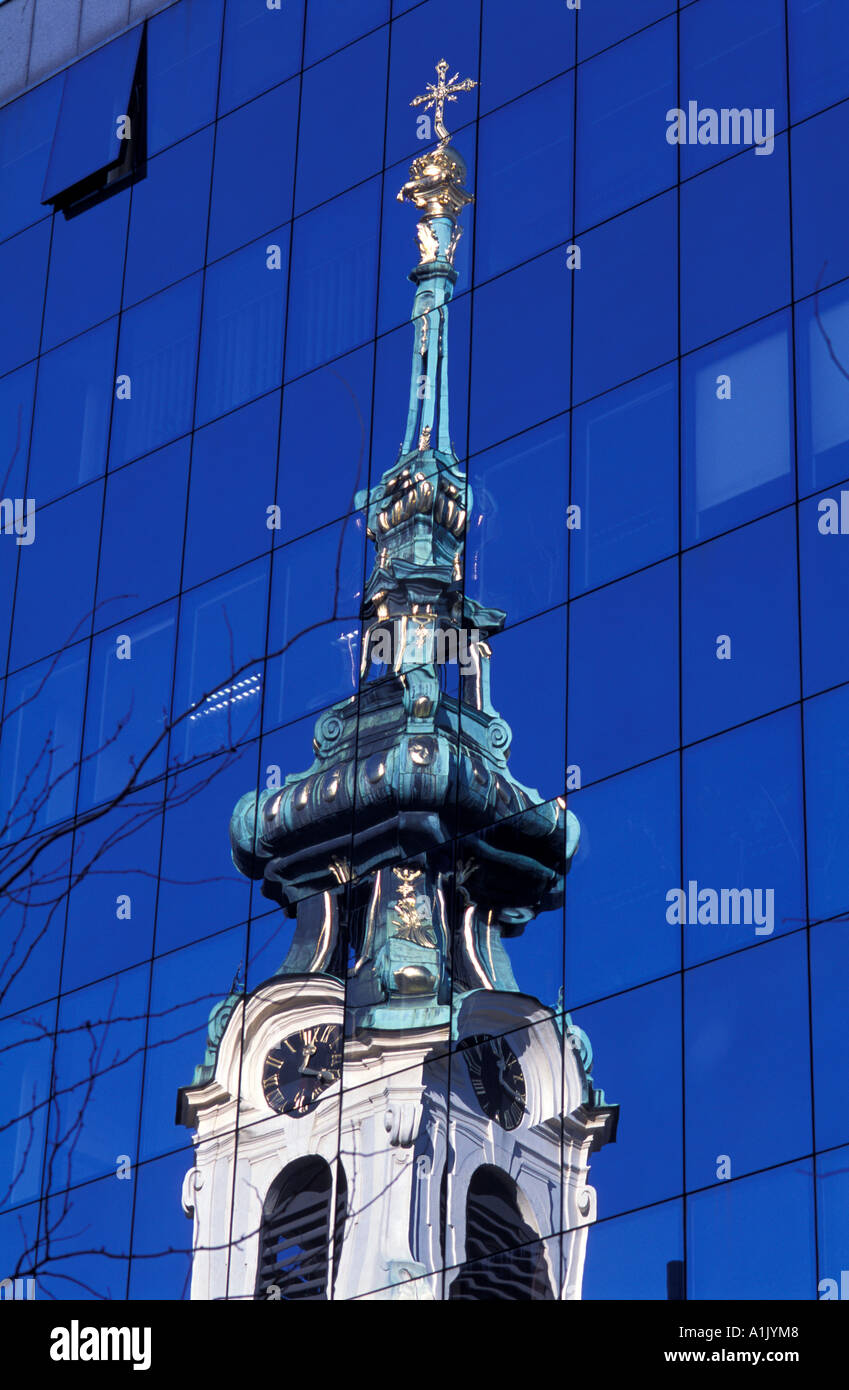 Stiftskirche reflected in the Virgin store on Mariahilferstrasse Vienna Austria Stock Photo