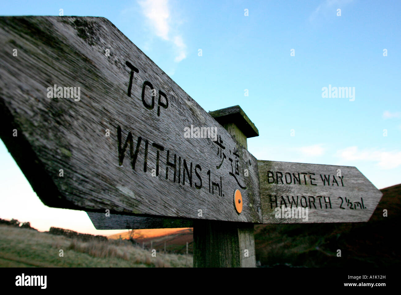 Signpost containing Japanese directions near Bronte Waterfalls, Haworth