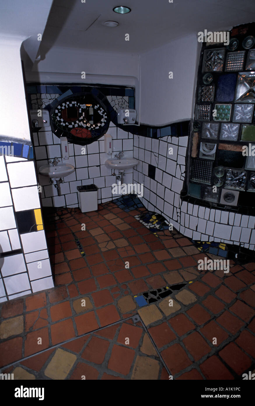 Unconventional toilets in the KunstHouseWien Restaurant built by Hundertwasser Vienna Austria