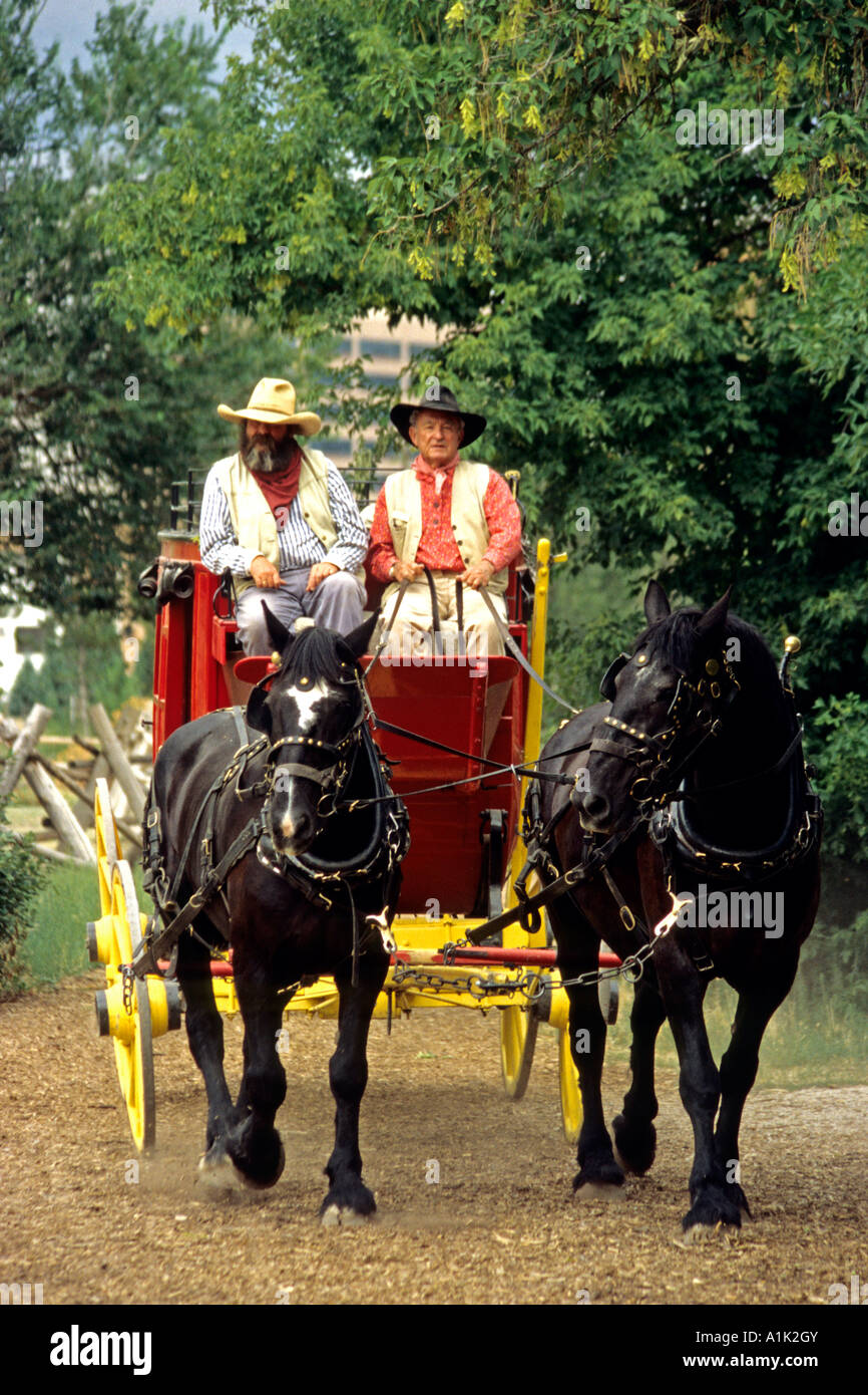 Stagecoach rides through Four Mile Historic Park, Denver, Colorado Stock Photo