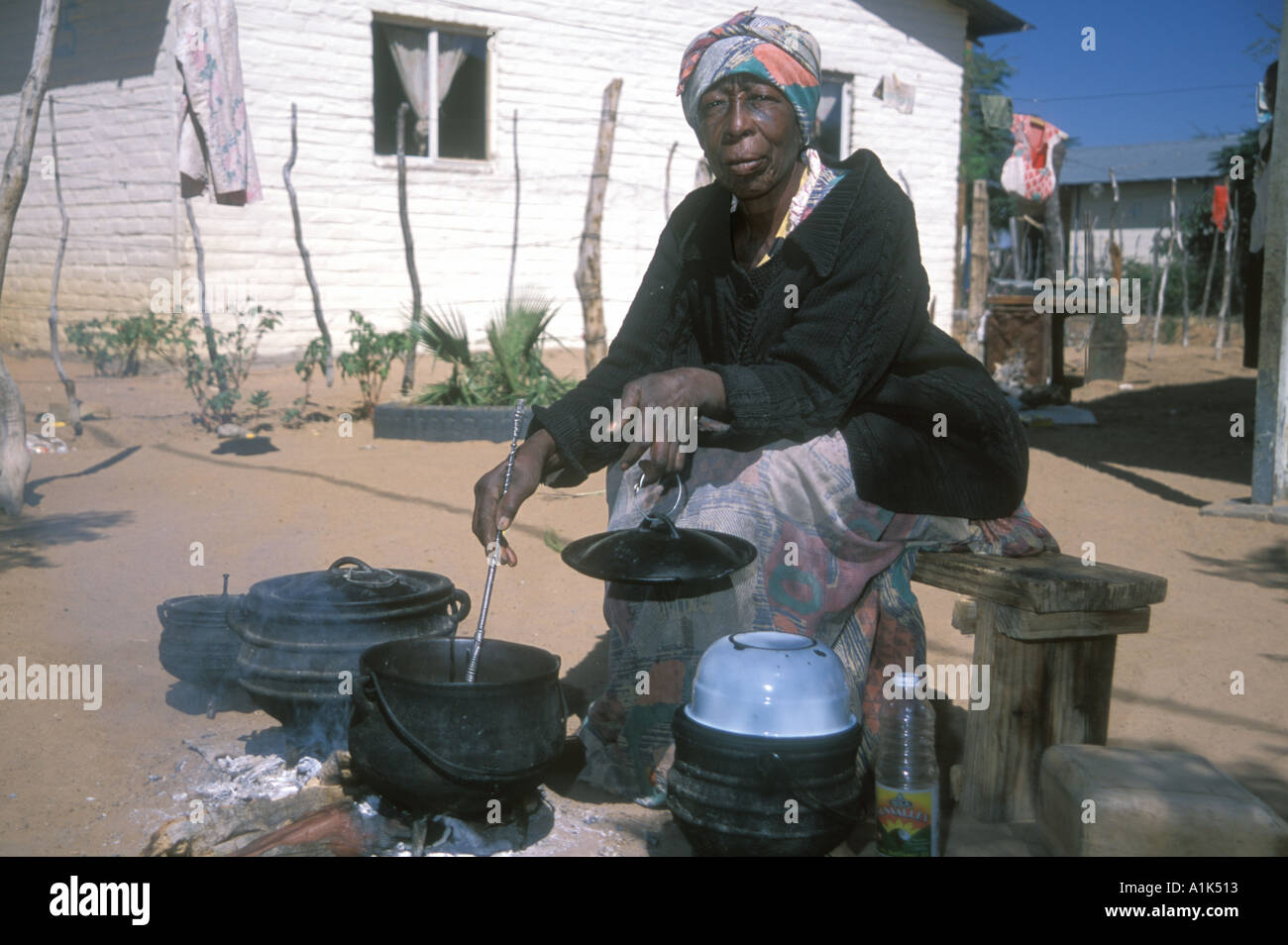 San woman small town of Drimiopsis in Central eastern Namibia San bushmen have an oriental look and heart shaped faces Namibia Stock Photo