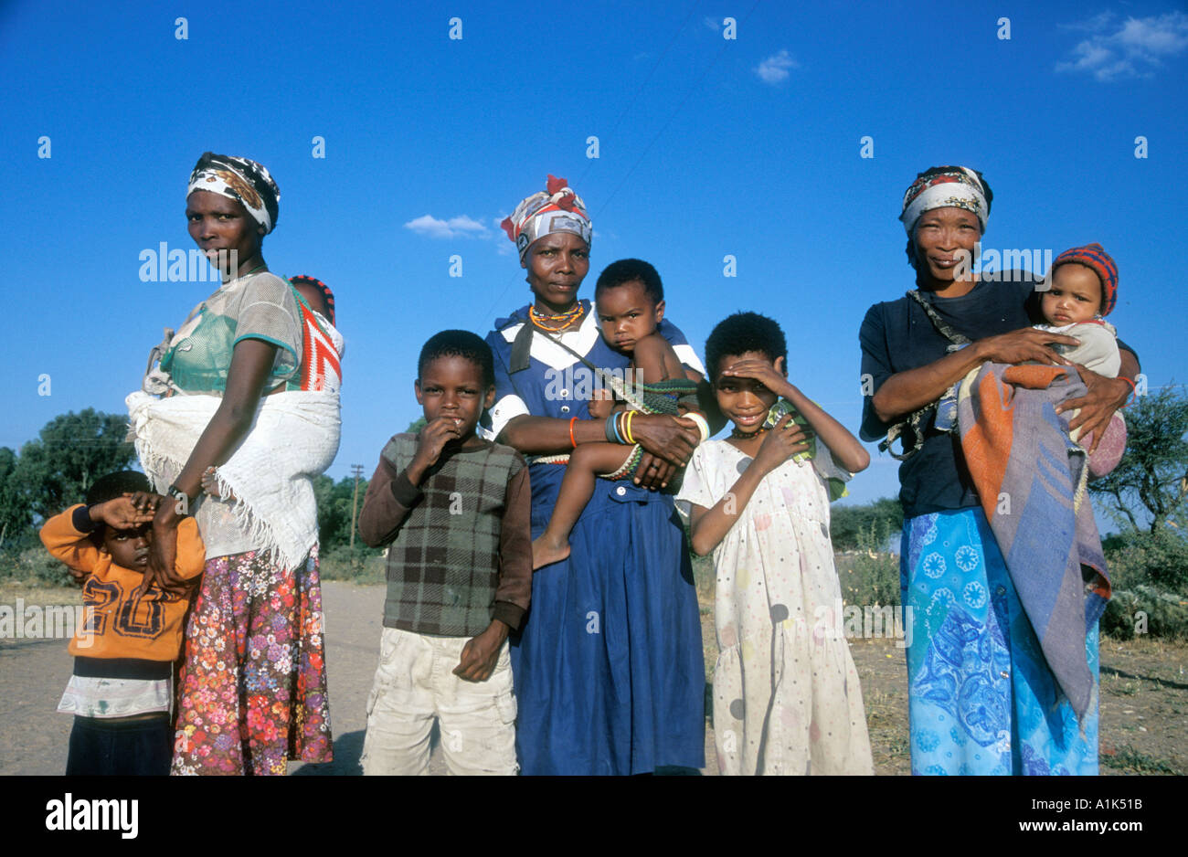 San women and children in small town of Drimiopsis in Central eastern namibia San bushmen have an oriental look and heart Stock Photo