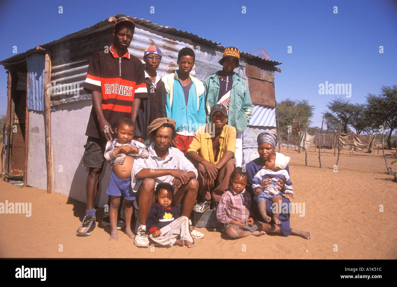 San extended family small town of Drimiopsis in Central eastern  Namibia San bushmen have an oriental look and heart shaped Stock Photo