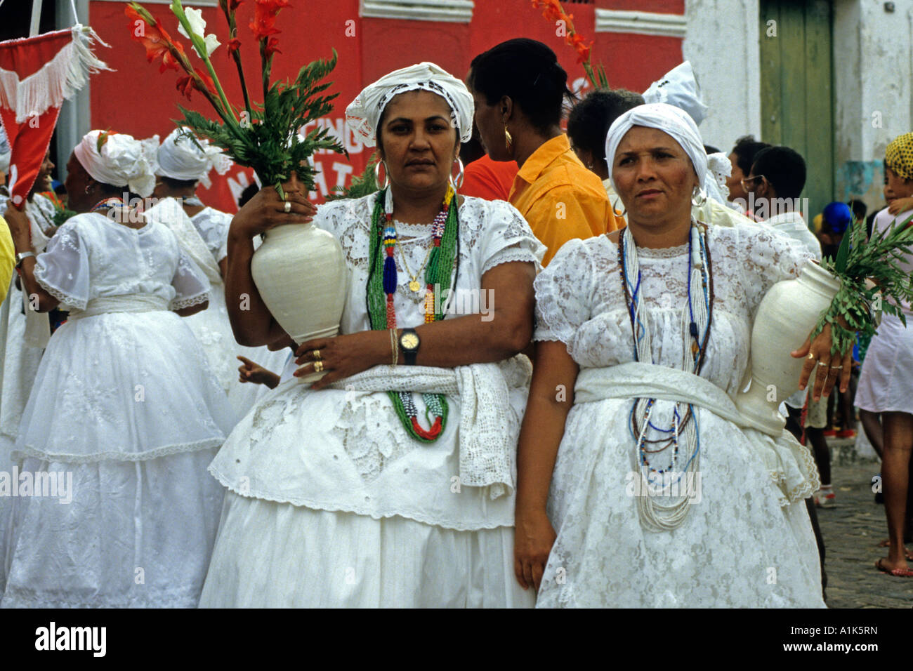 Two Bahian woman, dressed in traditional attire, get ready for a