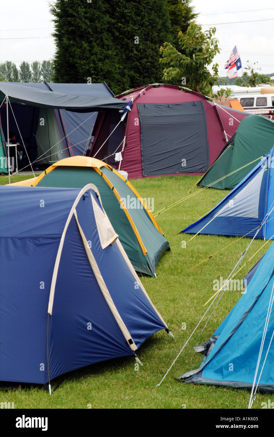 tents at out door music festival camp camping site canvas live guy rope