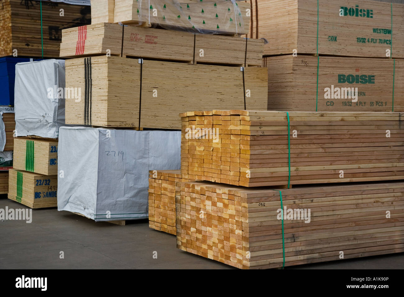 Bundles of lumber near a home center Stock Photo