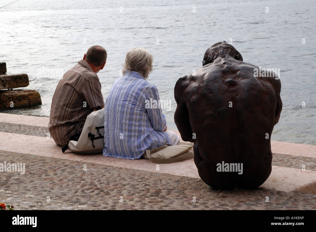 Sitting man lake garda hi-res stock photography and images - Alamy