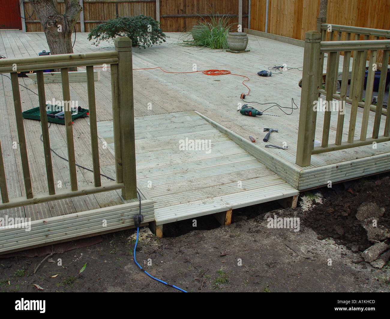 Deck deck construction with access ramp for wheelchair Stock Photo Alamy