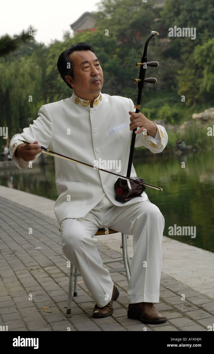 Beijing residents play Chinese folk musical instrument 2006 Stock Photo