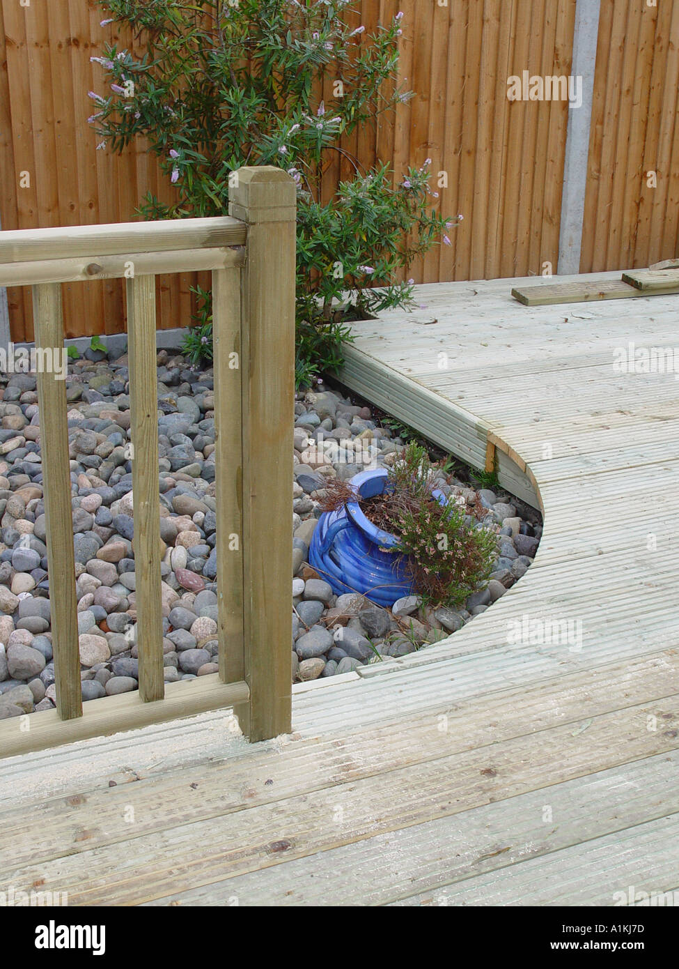 Timber decking showing curve cut into the deck Stock Photo Alamy