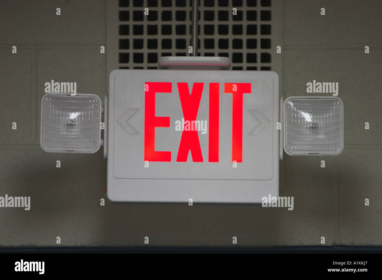 A glowing electric exit sign Stock Photo - Alamy