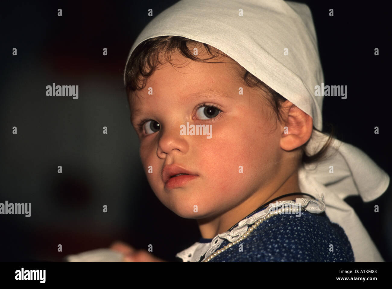 Basque girl age 4 to 6 wearing traditional dress and scarf  Stock Photo