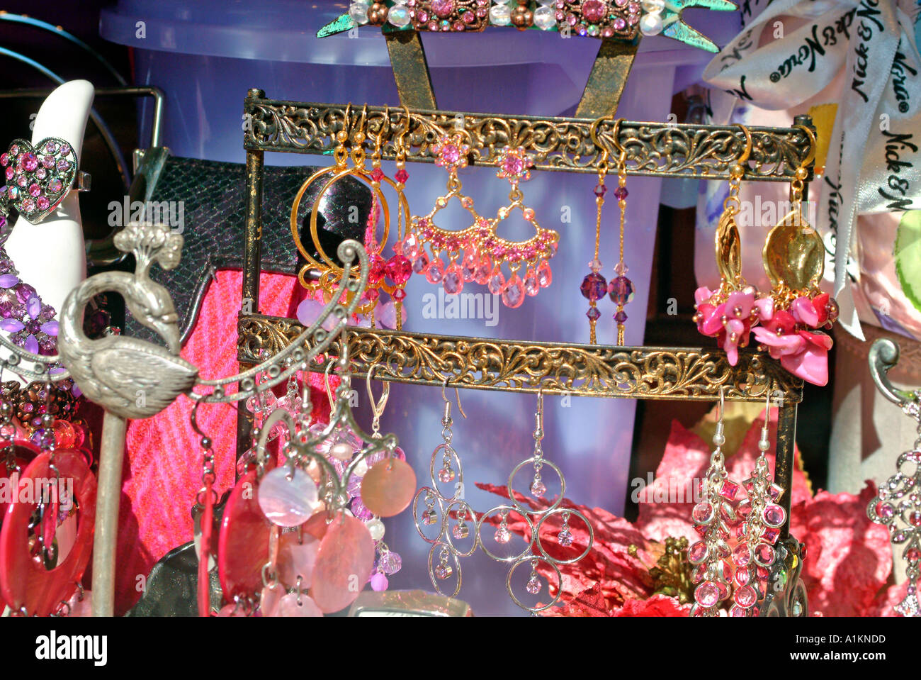 Trinkets and jewelry in retail store window Stock Photo