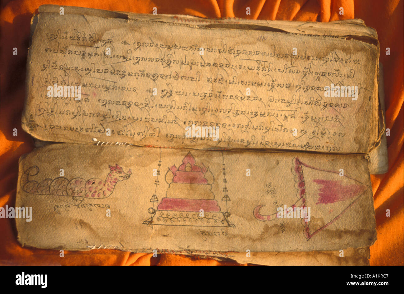 BUDDHISM old  pages of the Pali canon  from Cambodia Stock Photo