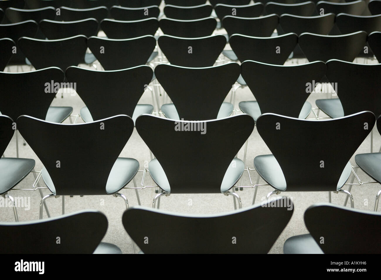 Rows of seats in hall Stock Photo
