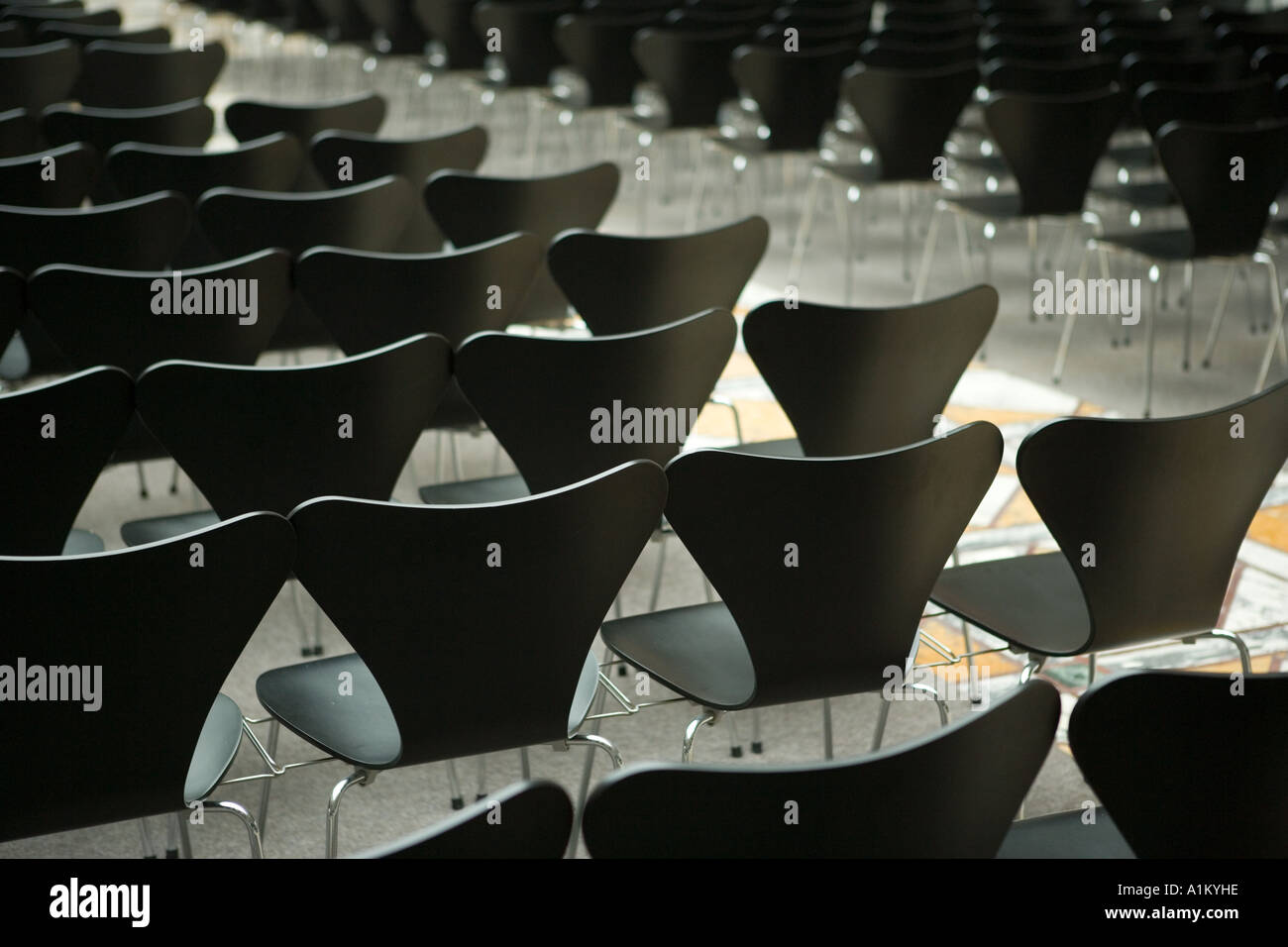 Rows of seats in hall Stock Photo