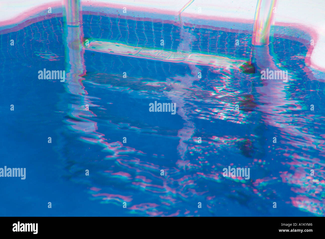 Abstracted picture of swimming pool ladder and water Stock Photo
